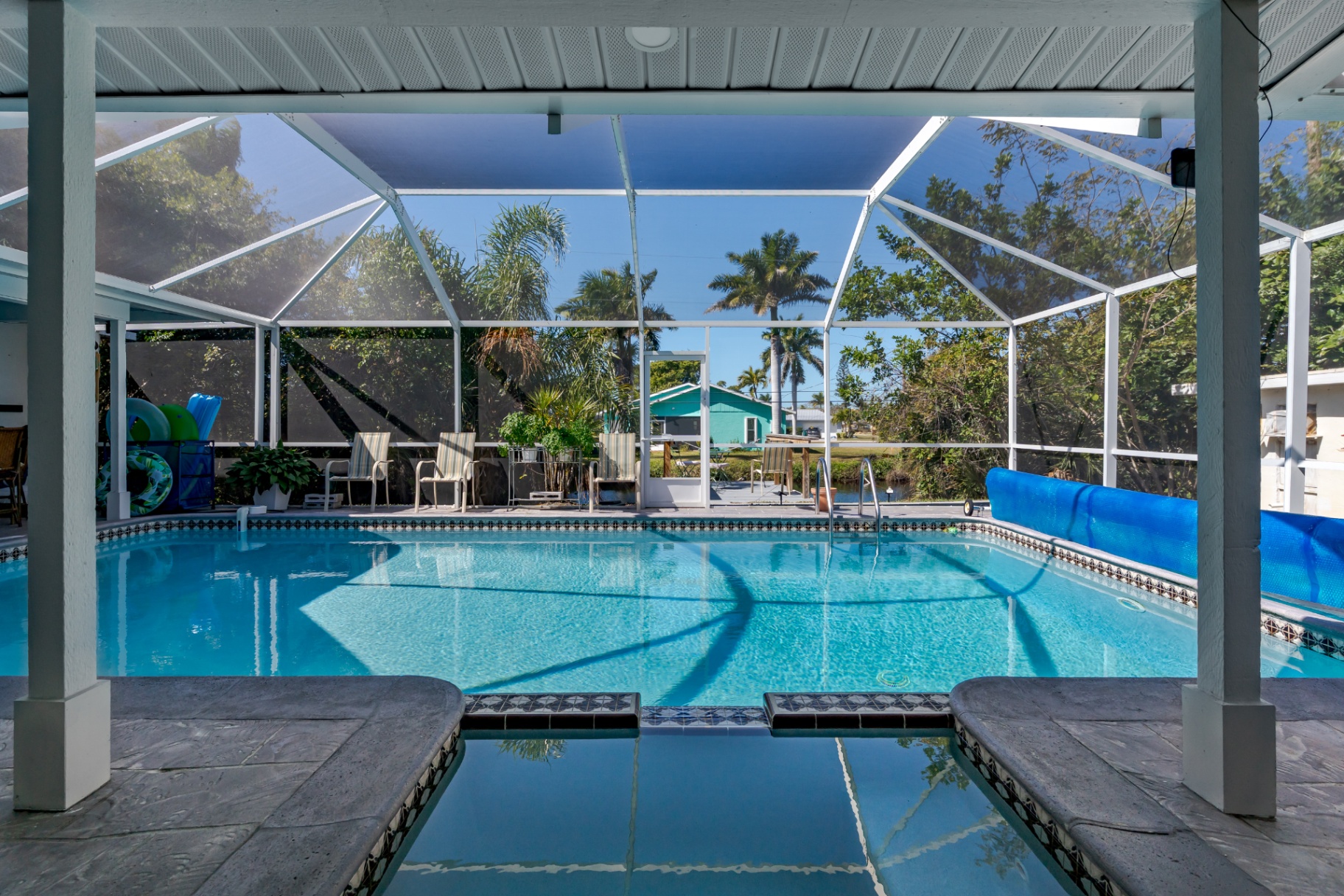 16x32 heated saltwater pool under a screened lanai