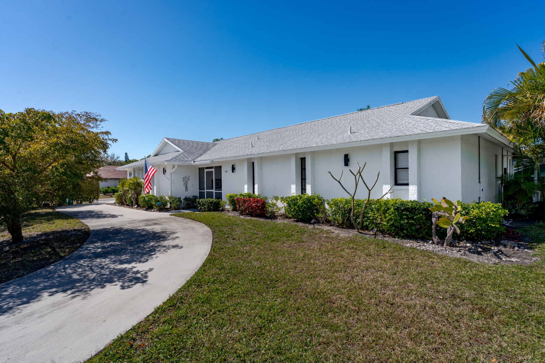 Front exterior of 661 East Valley Dr, Bonita Springs FL